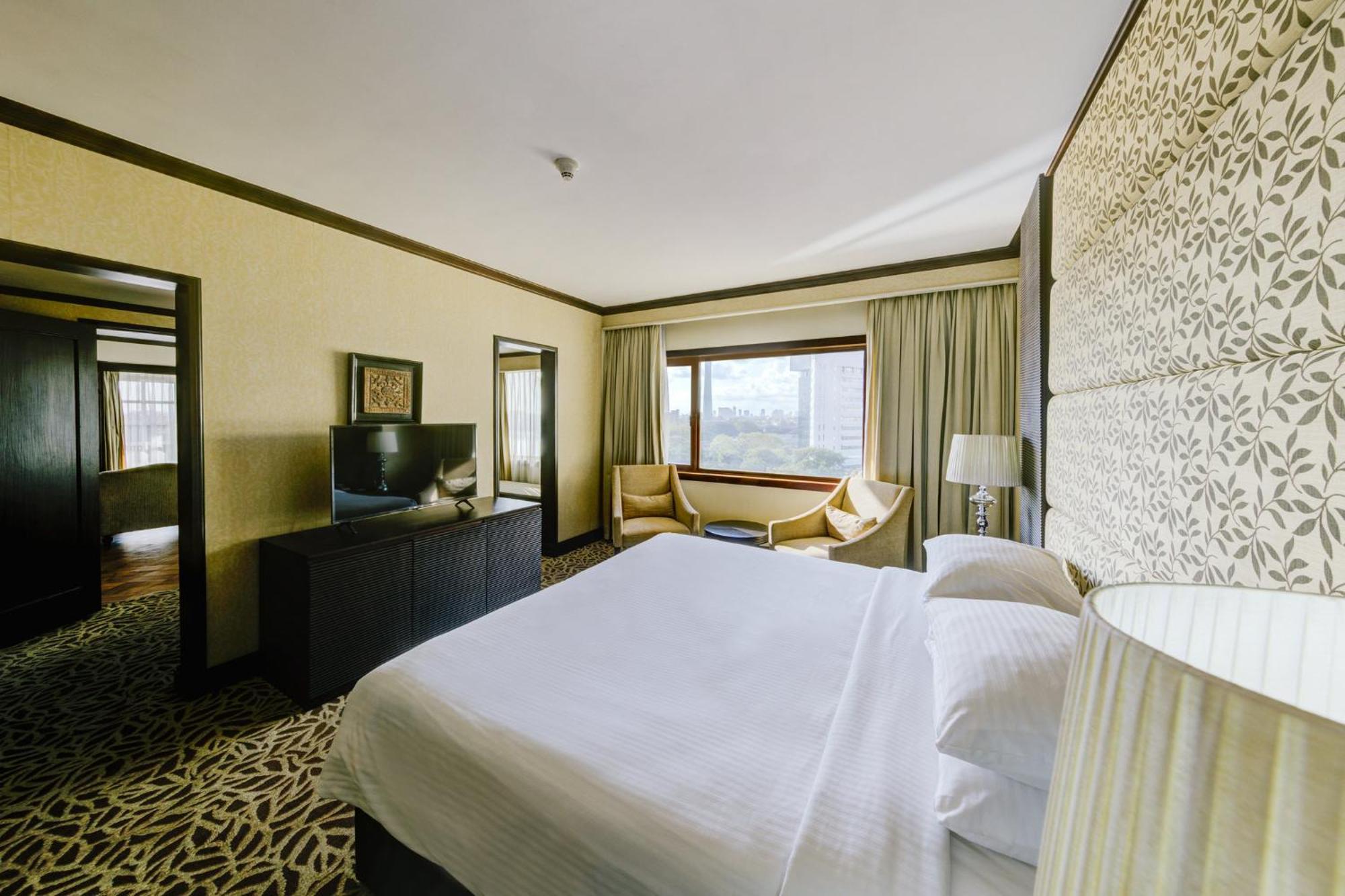 فندق سينامون ليكسايد كولمبو المظهر الخارجي الصورة A bedroom at the hotel